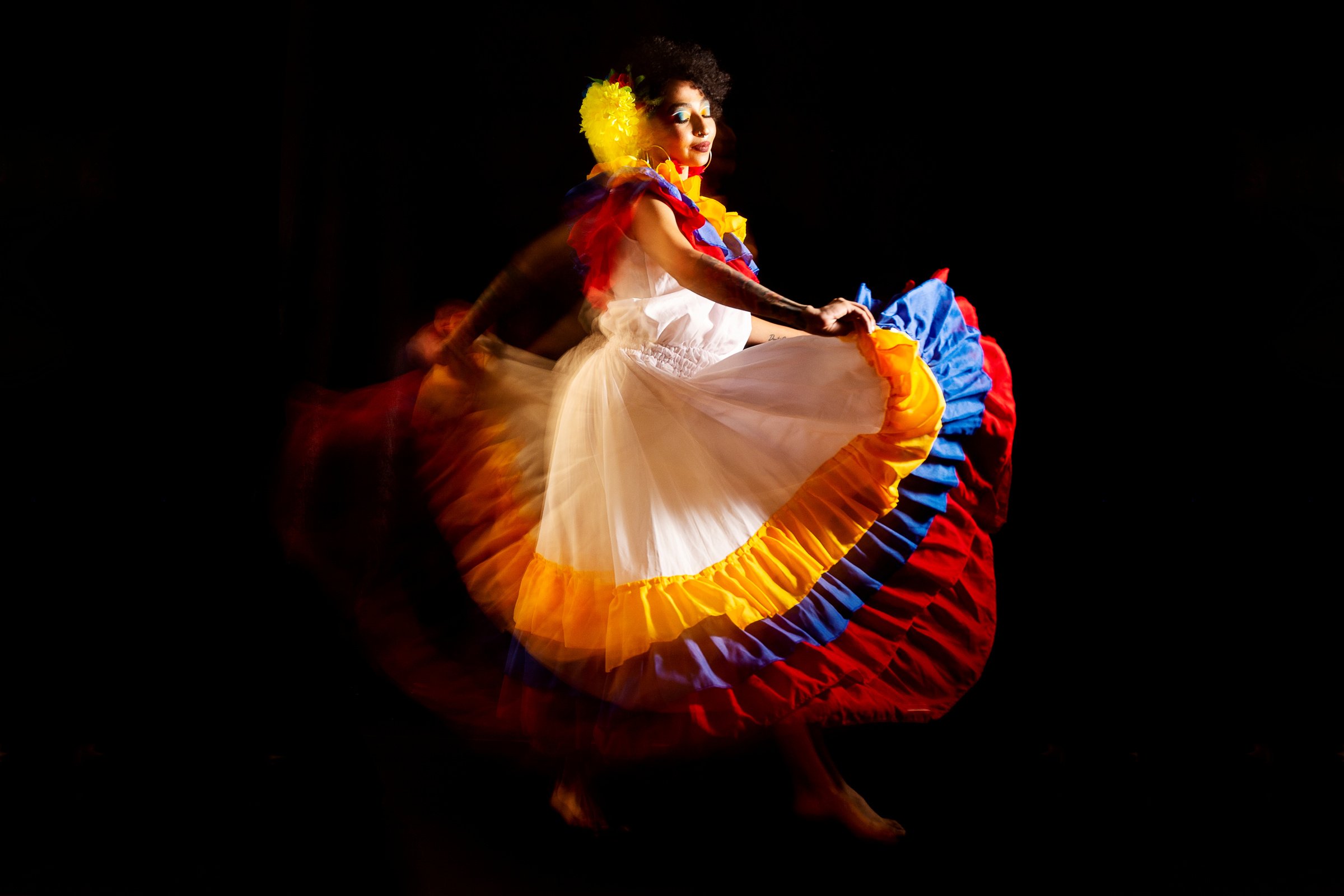 Woman Dancing Flowing Cumbia in Motion